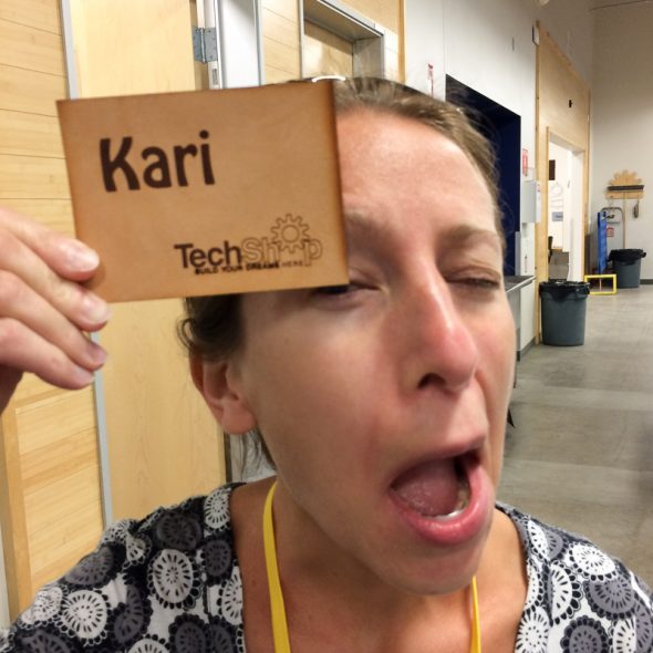 The first thing we had to do was take a training class, in which we etched and cut our own leather patches. Kari was particularly proud of hers.