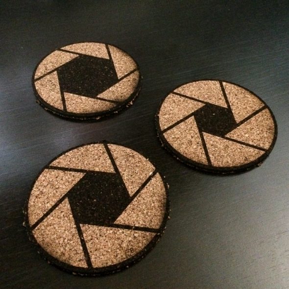 Aperture coasters. Yes, each one is different, ranging from f/2.8 to f/16. Functional AND educational!