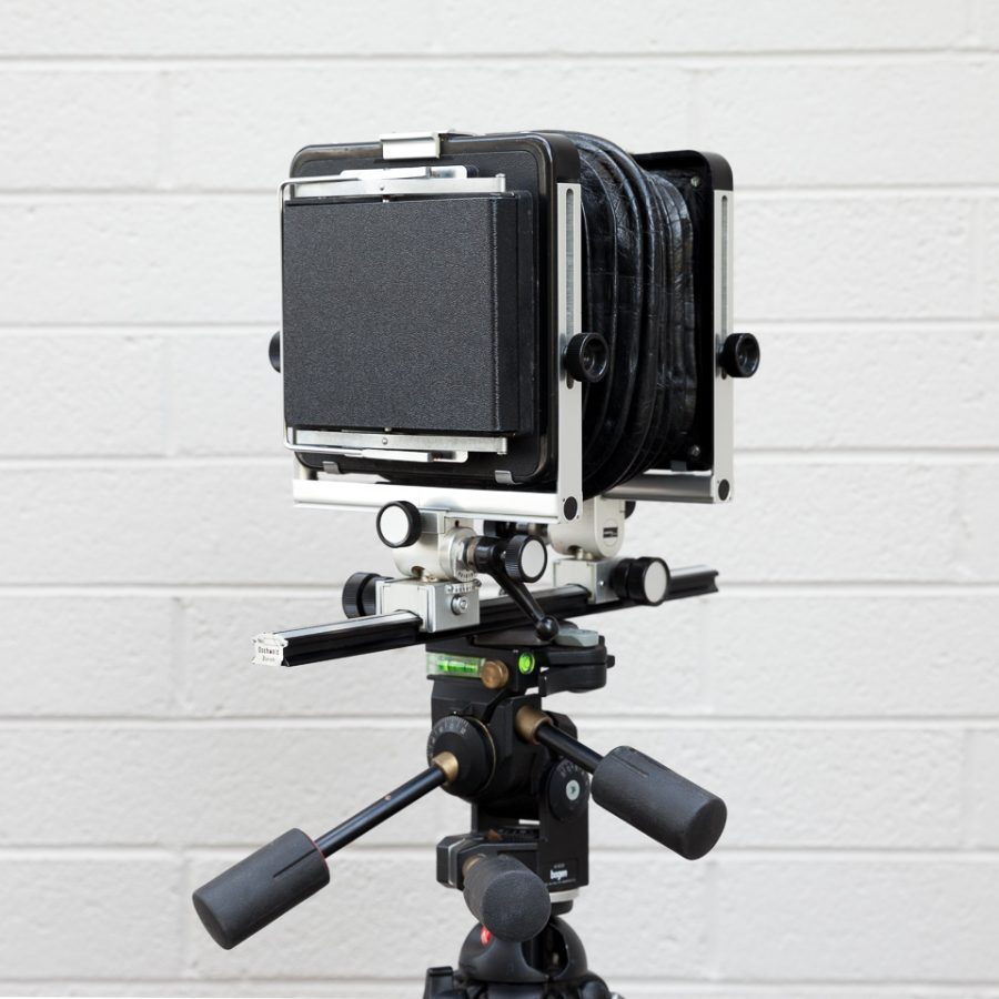 Basic black ABS plastic protective cover. Shown here on a 4x5 camera.