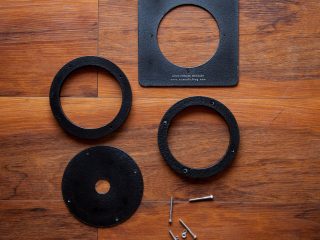 DIY Recessed Lens Board: waterjet, powdercoating, and of course, lasers