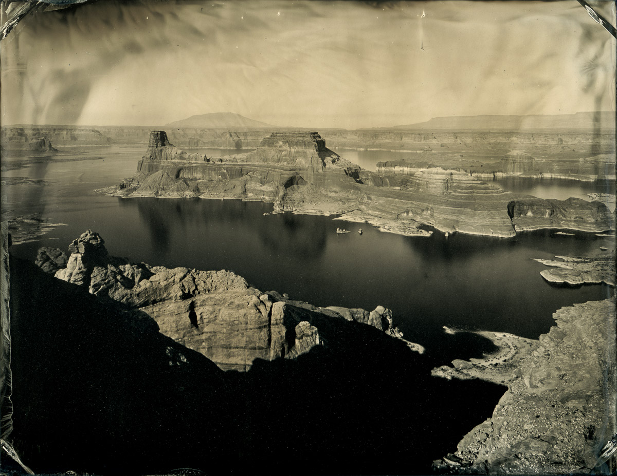 View from Alstrom Point, Lake Powell, Gunsight Butte, and Navajo Mountain in the distance.