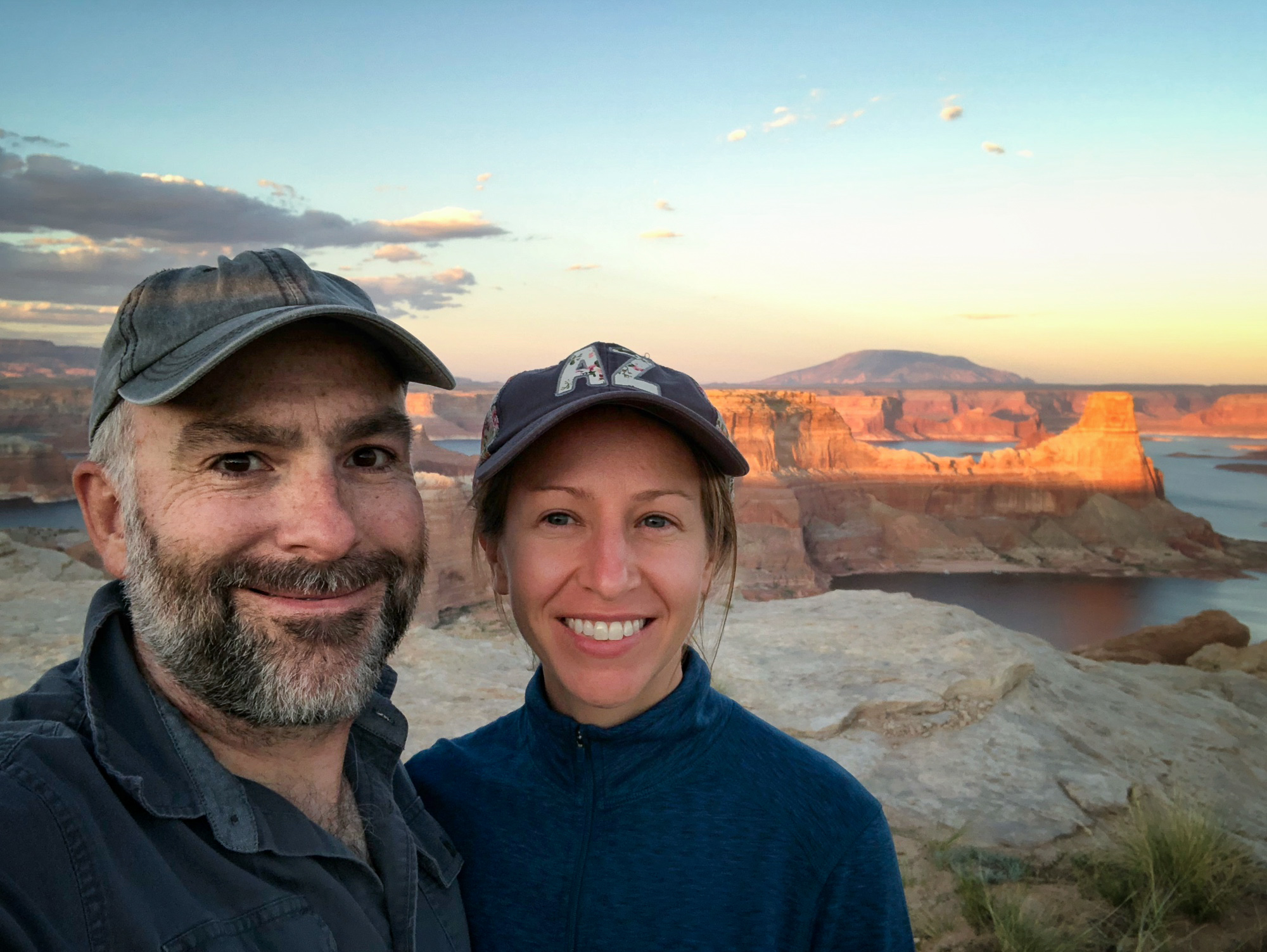Mark and Kari at Alstrom Point, with Gunsight Butte and Navajo Mountain in the distance.